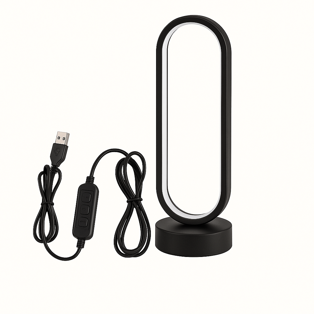 Black oval LED desk lamp with USB cable and inline controller, emitting warm white light, on circular base