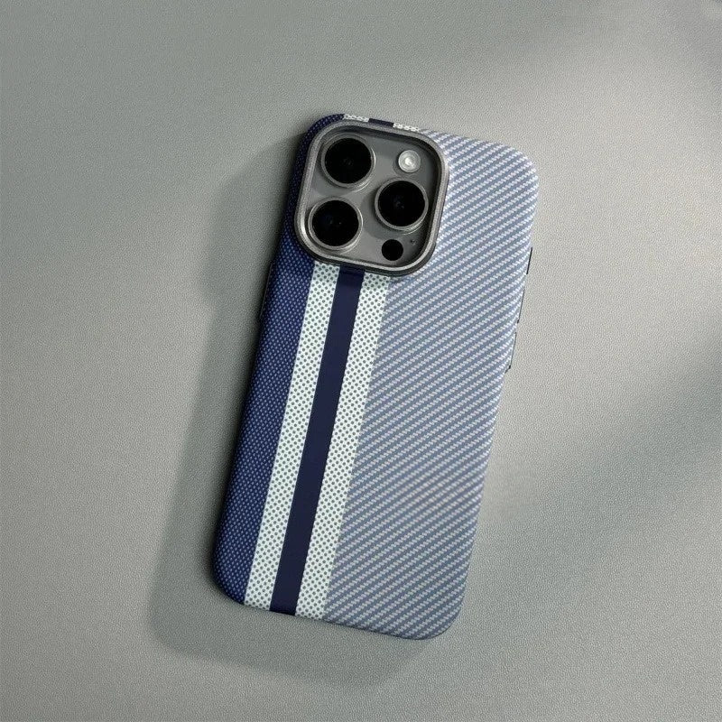 Blue and white striped textured phone case with triple camera cutout, featuring navy racing stripes on carbon fiber pattern.