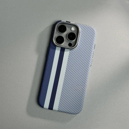 Blue and white striped textured phone case with triple camera cutout, featuring navy racing stripes on carbon fiber pattern.