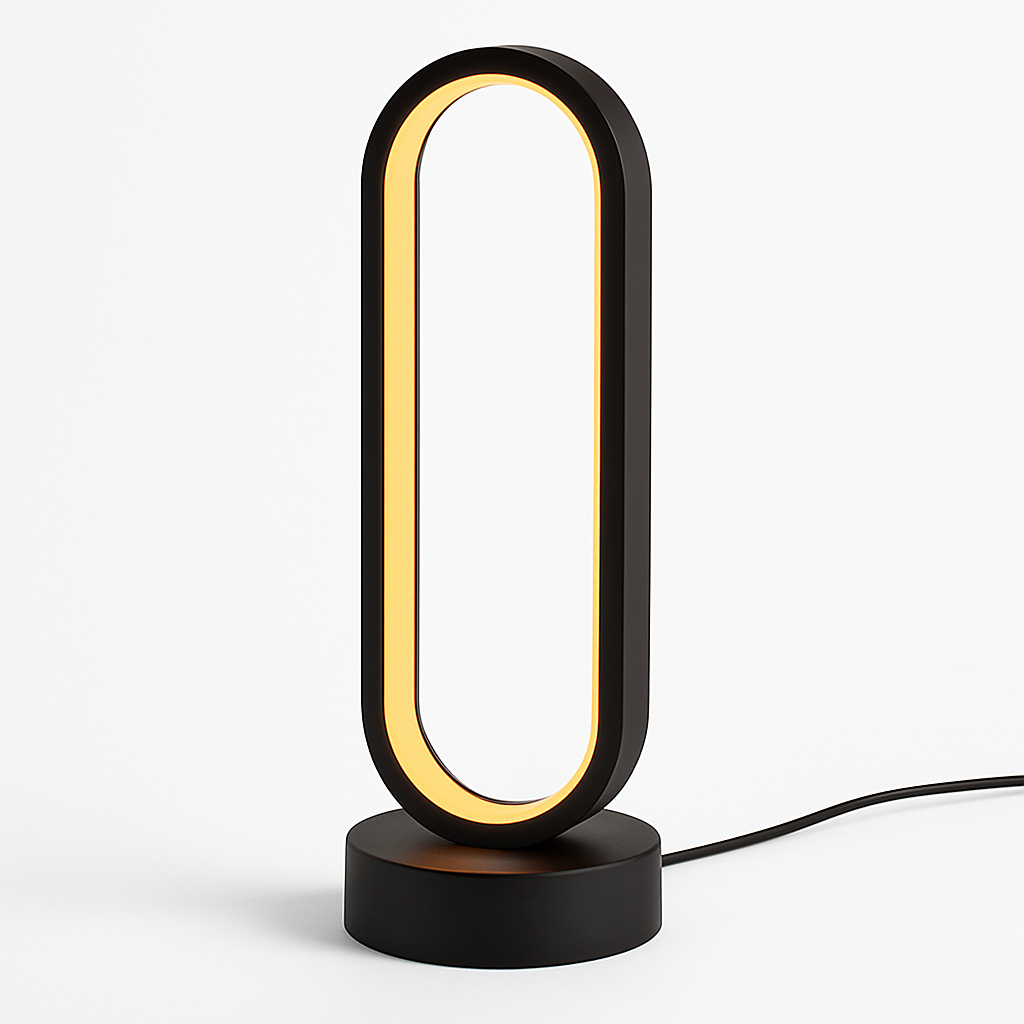 Black oval-shaped LED desk lamp with warm golden light strip on circular base, modern minimalist design, power cord visible.