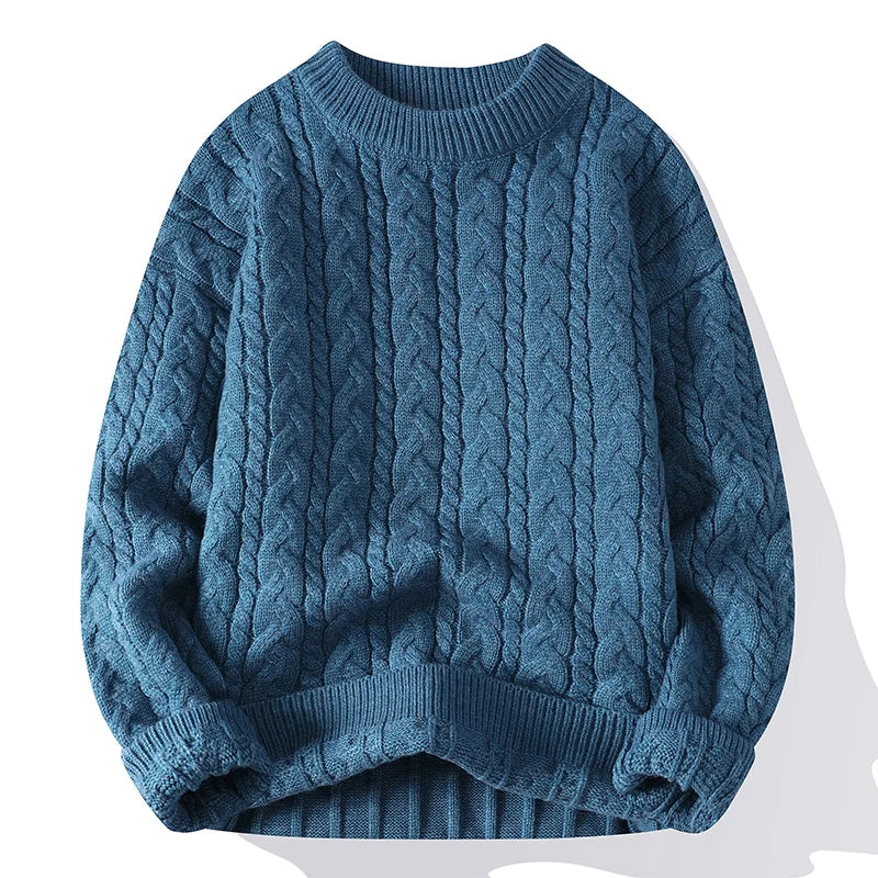 Men's blue cable knit wool blend crewneck pullover sweater with ribbed cuffs, hem, and collar detailing.