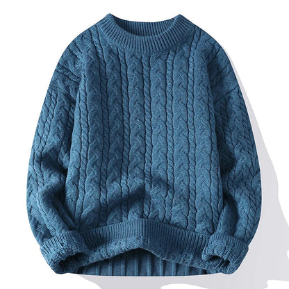 Men's blue cable knit wool blend crewneck pullover sweater with ribbed cuffs, hem, and collar detailing.
