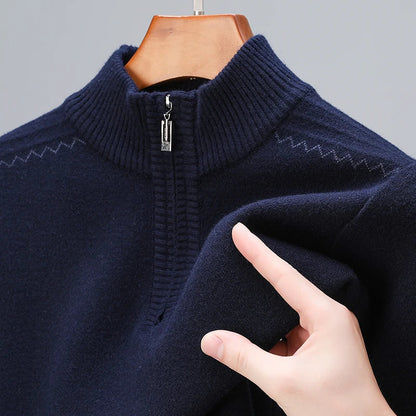 Navy blue wool blend men's quarter-zip sweater with ribbed mock neck collar and subtle zigzag pattern detail