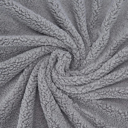 Gray faux fur plush throw blanket with swirling spiral texture pattern and soft fluffy sherpa-like surface
