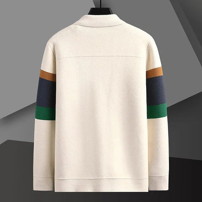 Cream men's cardigan back view with brown, navy, and green horizontal stripes on sleeves, hung on black hanger