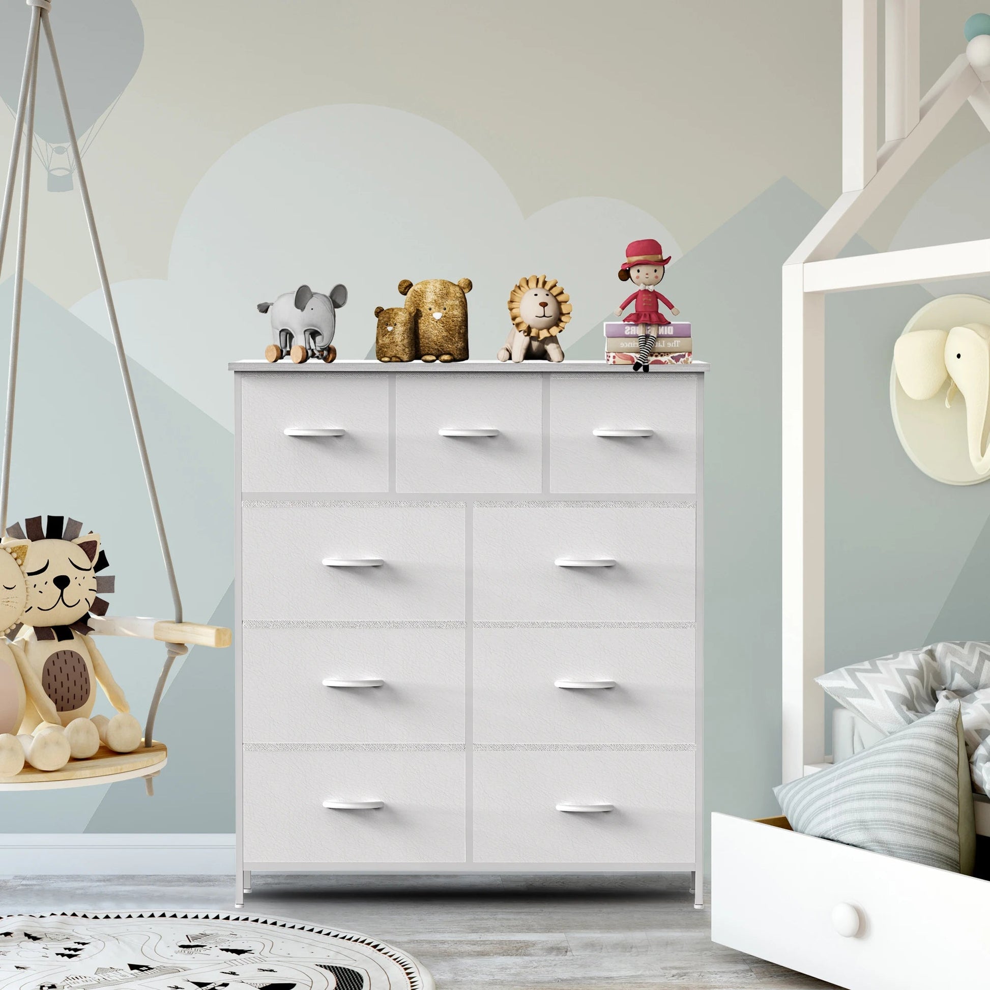 White 9-drawer dresser with steel frame in nursery room with toys and children's decor
