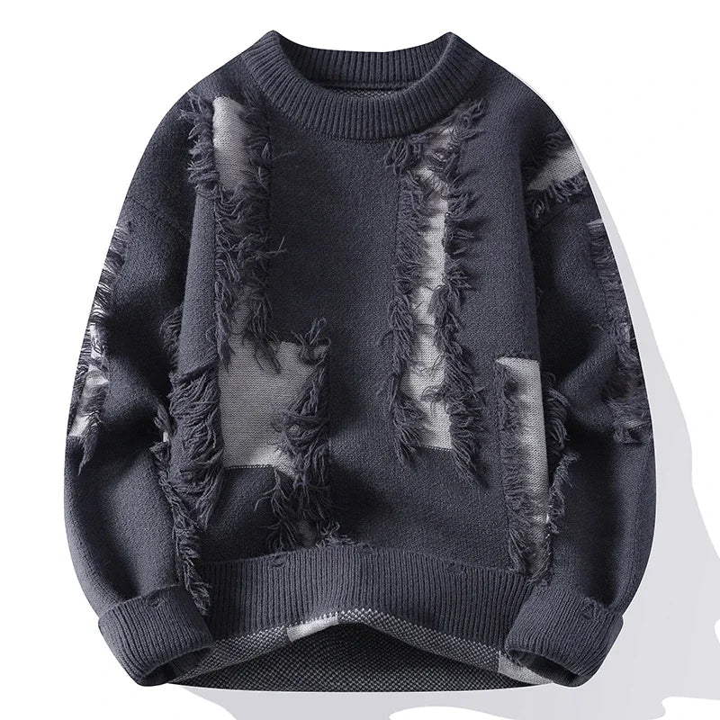 Dark gray men's distressed knit pullover sweater with frayed edges and intentional ripped detail patches