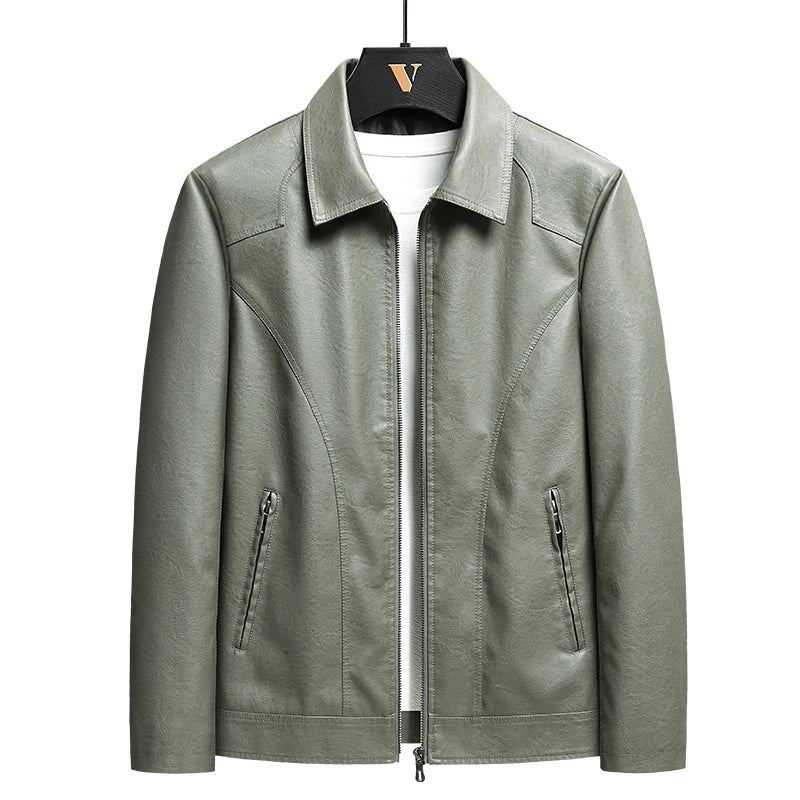 Sage green men's leather zip-up jacket with spread collar, side zip pockets, worn open over white tee