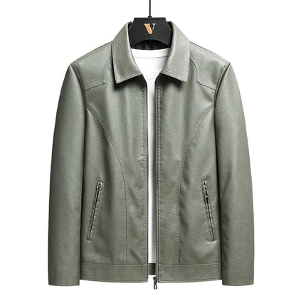 Sage green men's leather zip-up jacket with spread collar, side zip pockets, worn open over white tee
