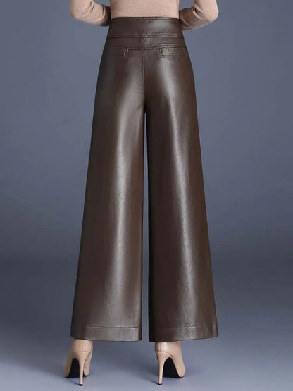 High-waisted brown vegan leather wide-leg pants for women, back view with beige heels