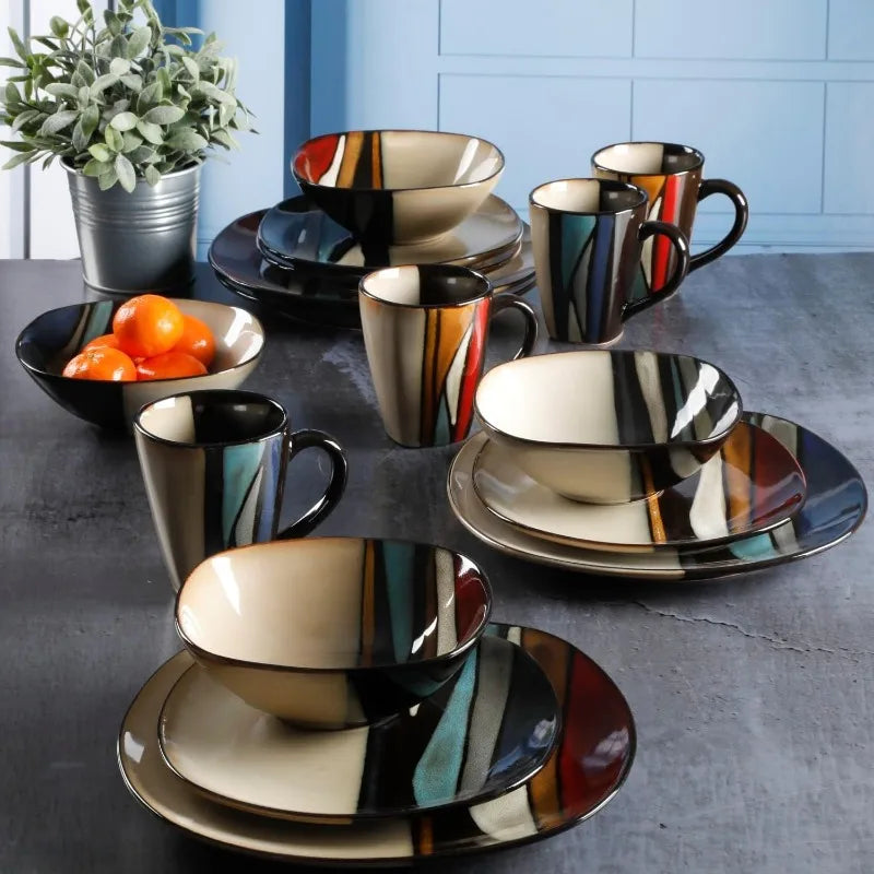 16-piece stoneware dinnerware set with bold multicolor striped pattern, includes plates, bowls, and mugs for 4.