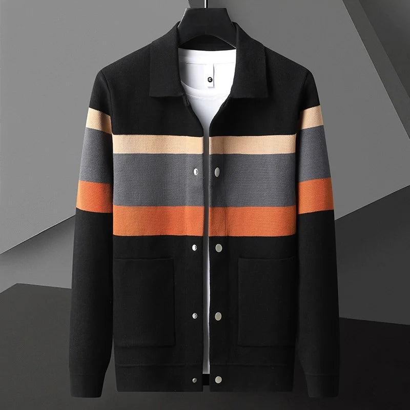 Black men's striped wool blend cardigan with tan, gray, orange accents, magnetic snap buttons, and front pockets on hanger