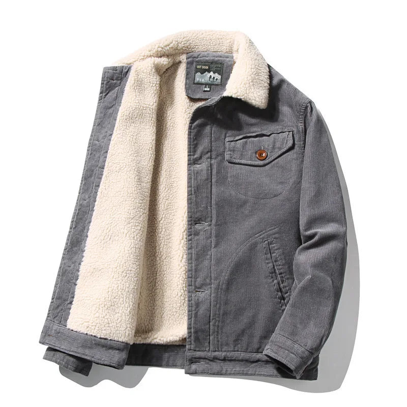 Gray men's sherpa-lined corduroy jacket with cream fleece interior, button closure, chest pocket, and outdoor patch logo.
