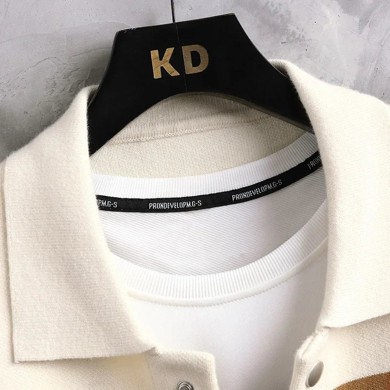Close-up of cream wool blend men's cardigan collar on black KD hanger showing white ribbed inner neckband with brand label