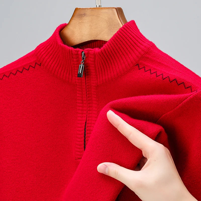 Red wool blend men's quarter-zip sweater with mock neck collar and zigzag pattern detail, shown on hanger.