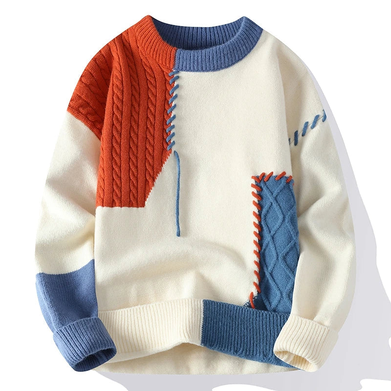 Color block cable knit wool sweater for men with orange blue cream geometric patches and ribbed trim